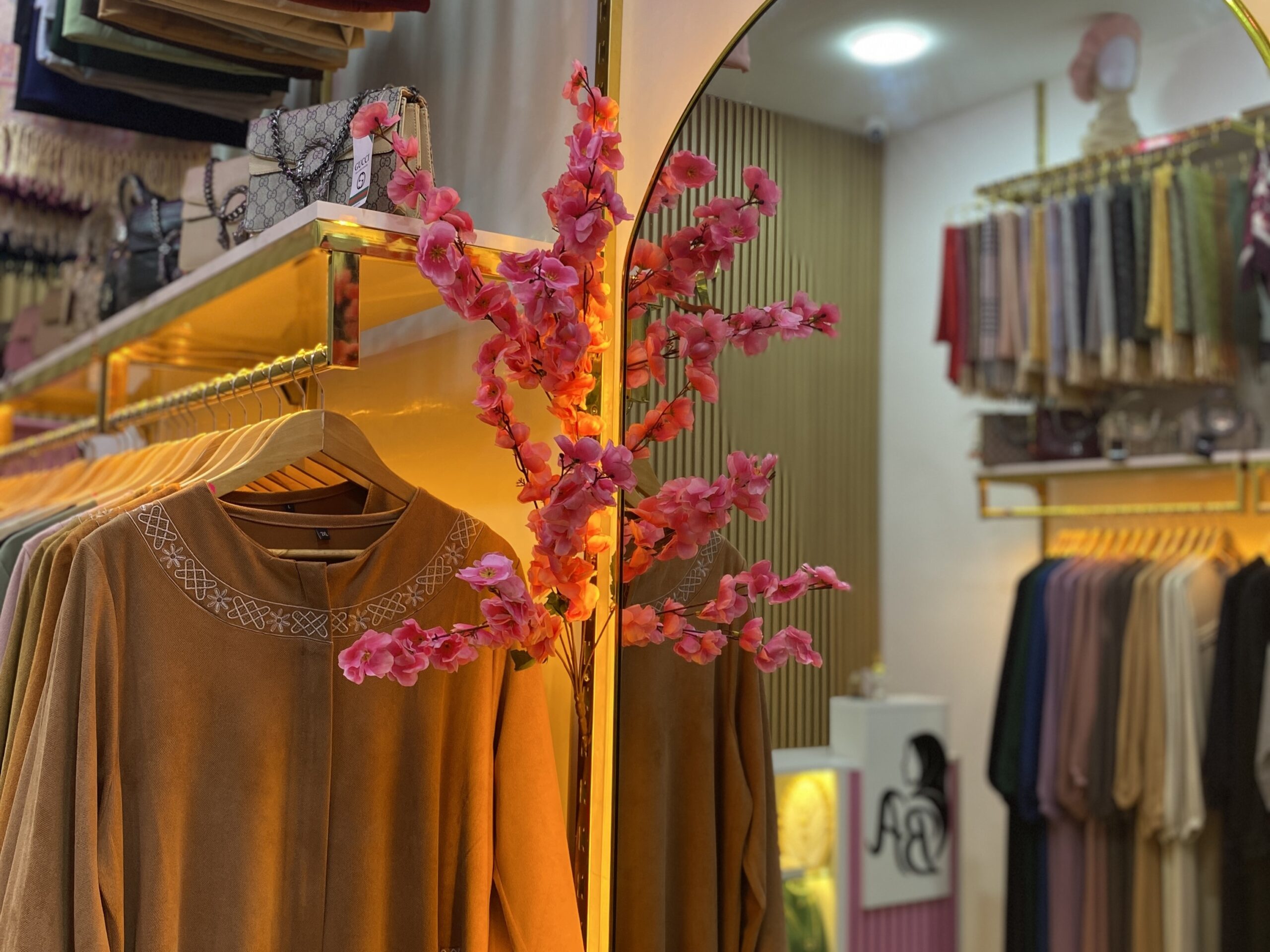 A soft boutique corner inside Belle Allure